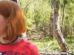Рыжая бесстыдница на природе дрочит волосатую киску для интимного видео